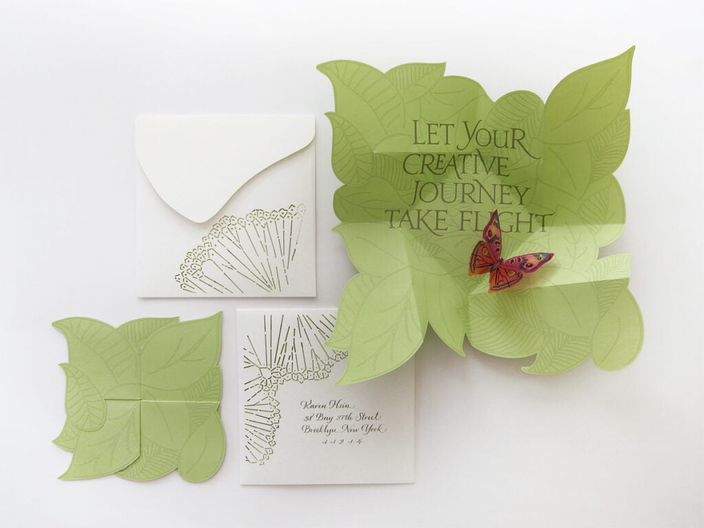 A Marcus Group Diecut Pop-up Butterfly mailer designed by Karen Hsin